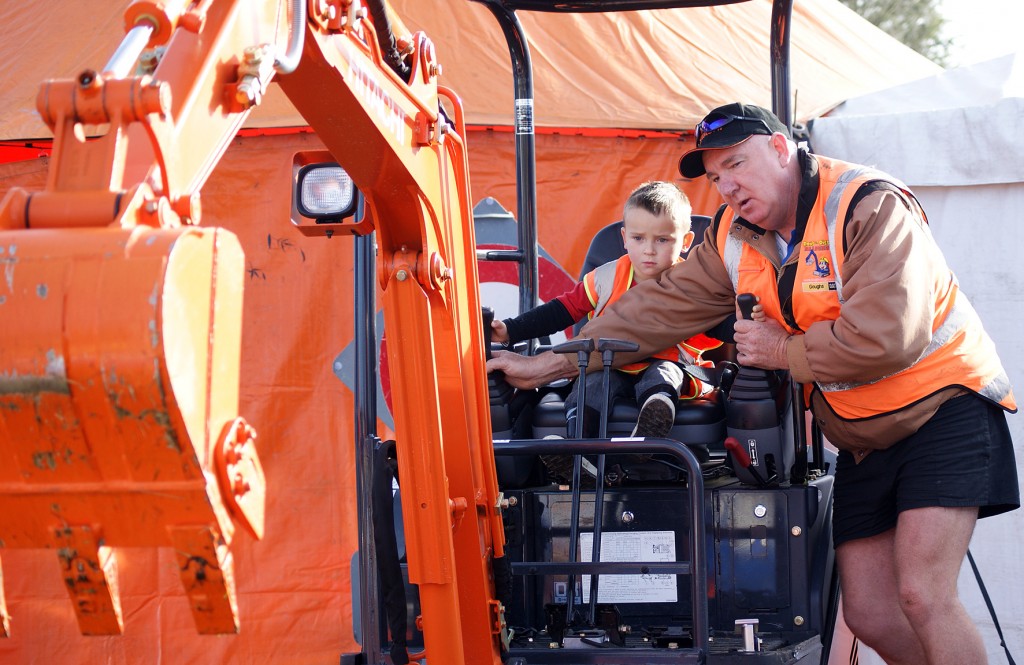 Alistair McIntyre gives Riley Shepherd a lesson on Doug the Digger