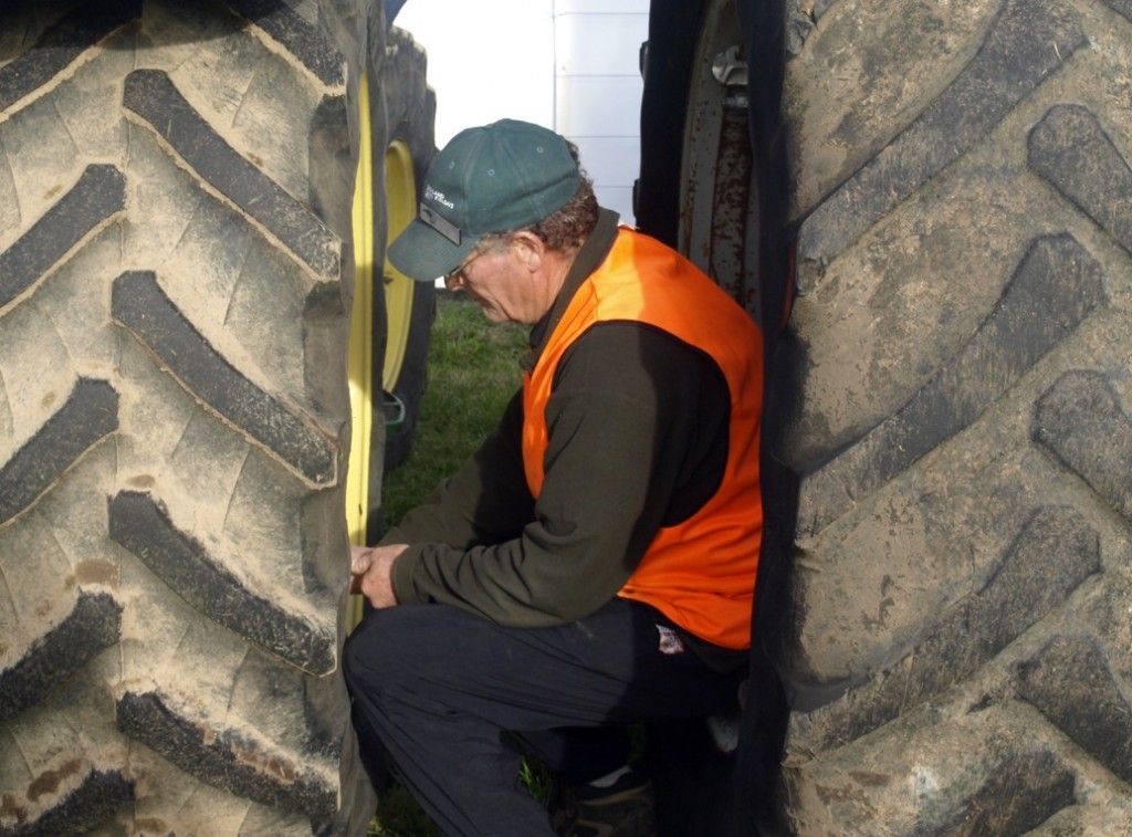 Barry Townsend readies his tractor to compete in the tractor pull for the 25th year in a row