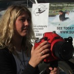 Closeup: Raglan photographer Jane Alice takes her shots out in the surf.