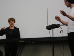 Lydia Kavina leads a music student through the first stages of playing a theremin