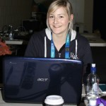 HARD AT WORK: Wintec journalism student Annie French, proudly clad in official RWC regalia, behind the scenes at the Wales-Fiji Rugby World Cup pool match on Sunday night.