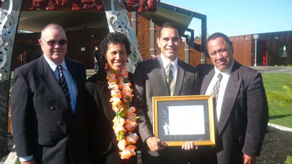 Achievement: Dr Peter Maulder with his parents Peter and Debbie and, right, Wiremu Puke.