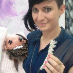 Morticia Jacobi with the toys made from possum bones.