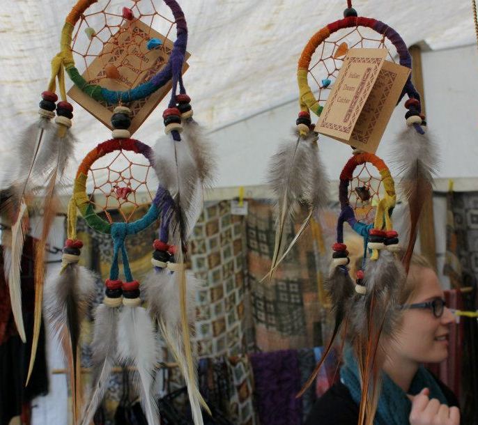 Shoppers browse the goods on sale at the Gypsy Fair