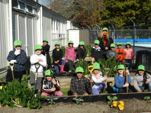 Students with their green caps on. Photo by Kathleen Payne.