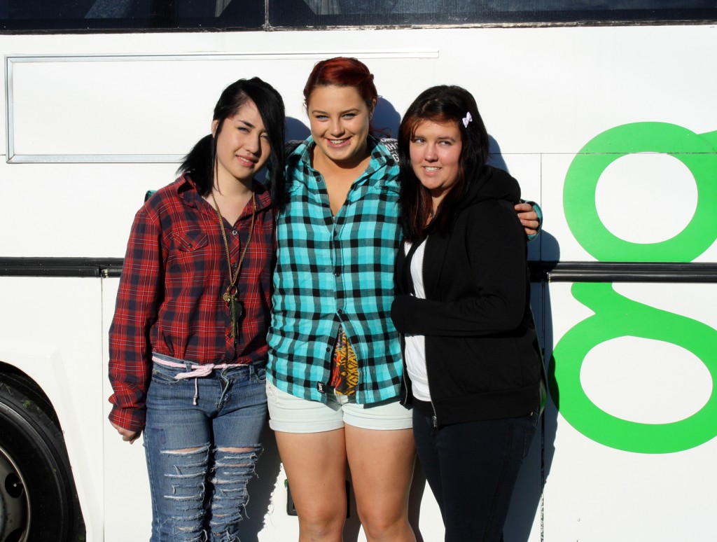 Caption: Lee Paton, Eden Ritchie and Skyla Smith all caught the bus Wednesday morning to Fieldays. Photo: Nikita Oliver