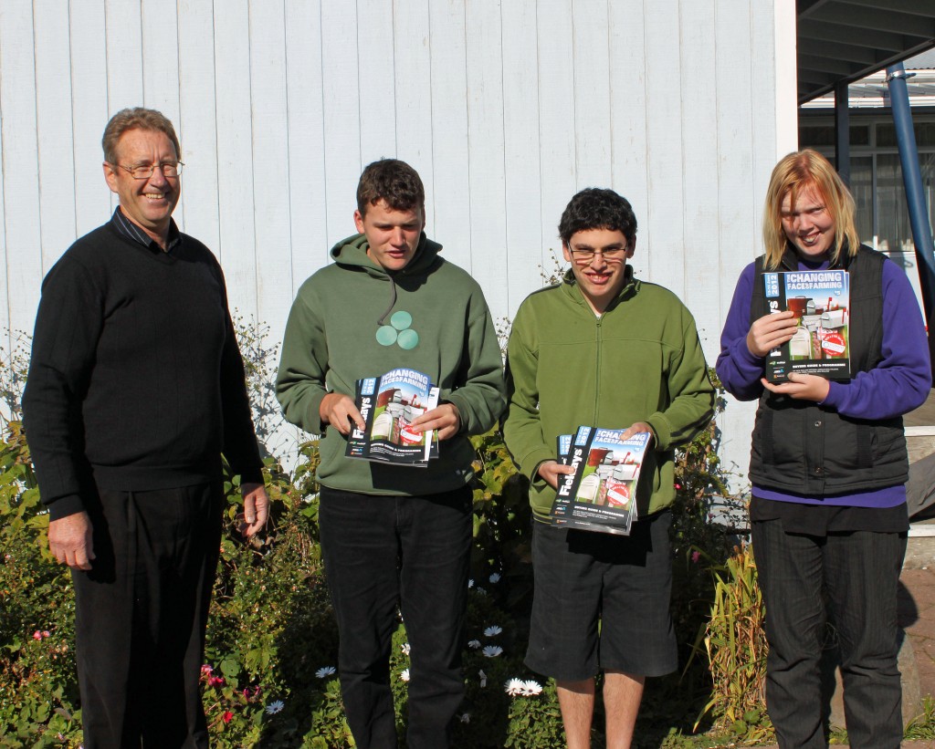 Caption: Tony Kane and students ,  Cooper Magee, Lauchy Stewart and Samantha Barr show the  Fieldays pr ogrammes they will pack and sell this year. Photos: Jennifer Robinson