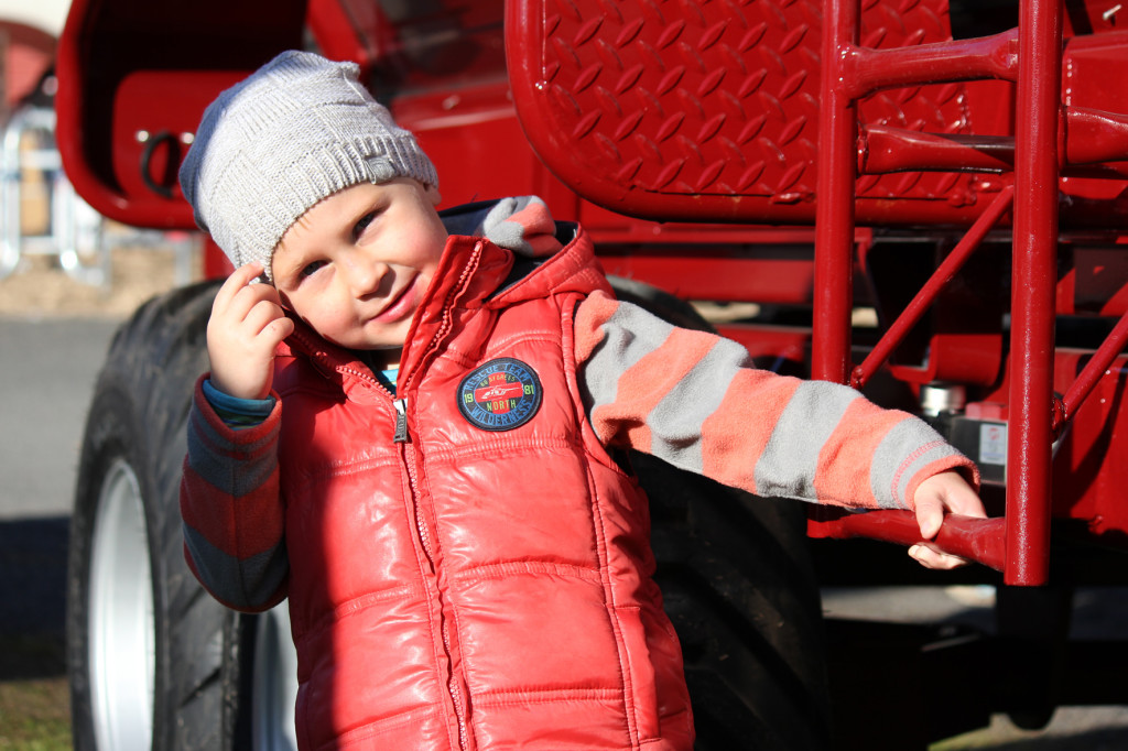 Keenan Feather, 3 years old, has come to Fieldays from Taupo. His parents are dairy farmers and have been at the event for two days. Photo: Rebecca Watson.