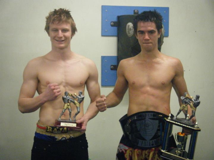 FIGHTING FIT: Daniel Geurts (left) and fellow competitor Lance Bishop show off the victors' spoils.