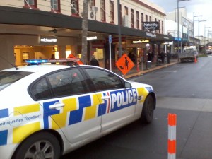 CORDONED OFF: Michael Hill assistants peer up Ward Street after it was closed to all traffic following a gas leak.