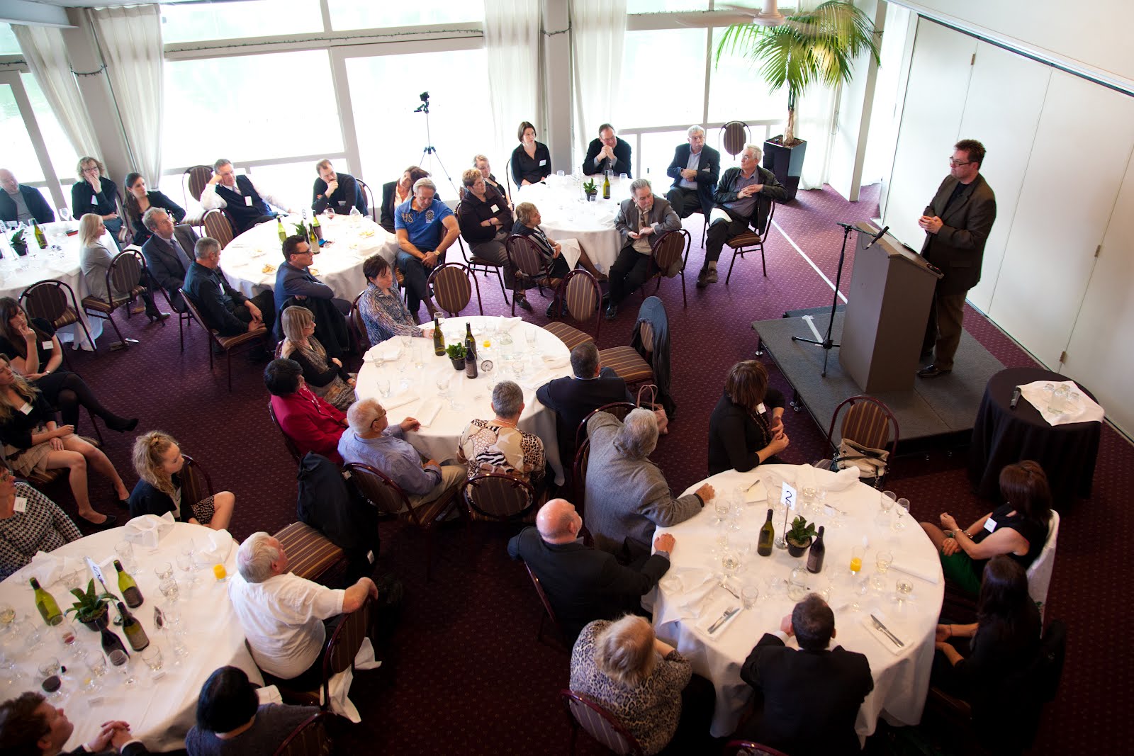 Audiences listen as Greg King speaks