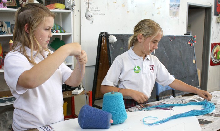 Kate Noble-Orton, 11 and Phoebe Balinska-Smith, 12 creating their buddy, Kat.