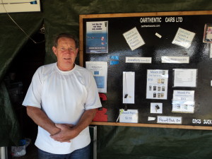 Rob McCarthy stands next to his display of rowing souvenirs. Photo: Ciaran Warner