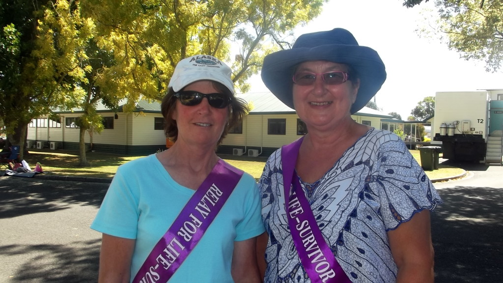 SURVIVORS: Deborah Hargreaves and Helen Painting show off their survivor sashes. Photo by: Candice Jones