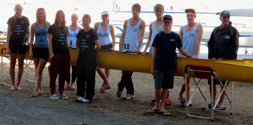 Te Awamutu College rowers with coach David Potts (left) in front of the girls U18 4X+ new boat . 