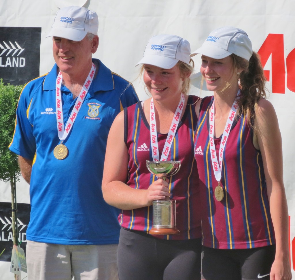 PROUD COACH: Coach Geoff McCrostie (left) said the week just went to plan for Kate Shaw (centre) and Libby Davenport (right)