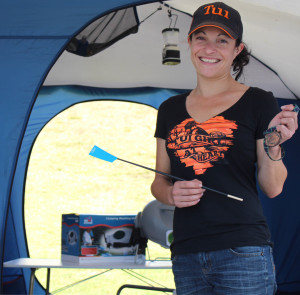 HARD WON: Sharnel Darrah displays her medal in one of her tents Photo Reese Flaxman