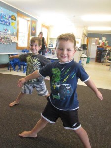 Thomas (back) and Jett (front) having fun doing yoga