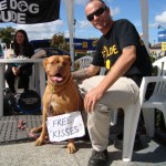 DOG DUDE: Hamish Young and his French Mastiff Zena helped the community learn how to deal with dogs at a Cambridge expo on Saturday. Photo: Sophie Iremonger