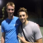 Nz Tennis Academy coach Nick Hatchett(left) still standing after 12 hours of playing tennis for charity. with tennis buddy Ido Drent at the Waikato Tennis Centre in Hamilton.