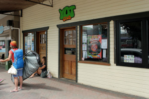 Surfers congregate outside the Yot Club ahead of Saturday's Rip Curl NZ Pro Tour event in Raglan