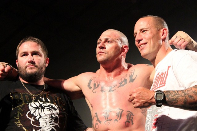 Andre "The Giant" Meunier (centre) with James Roesler (left) and promoter Ethan Shepp after his successful bout. Photo: Don Rowe