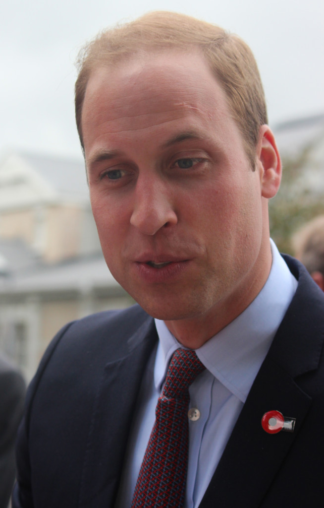 Prince William shaking people's hands in the crowd outside the Cambridge Town Hall. Photo: Mereana Austin