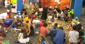LEGO GALORE: Parents and children creating their Lego cities. Photo by: Shontelle Cargill