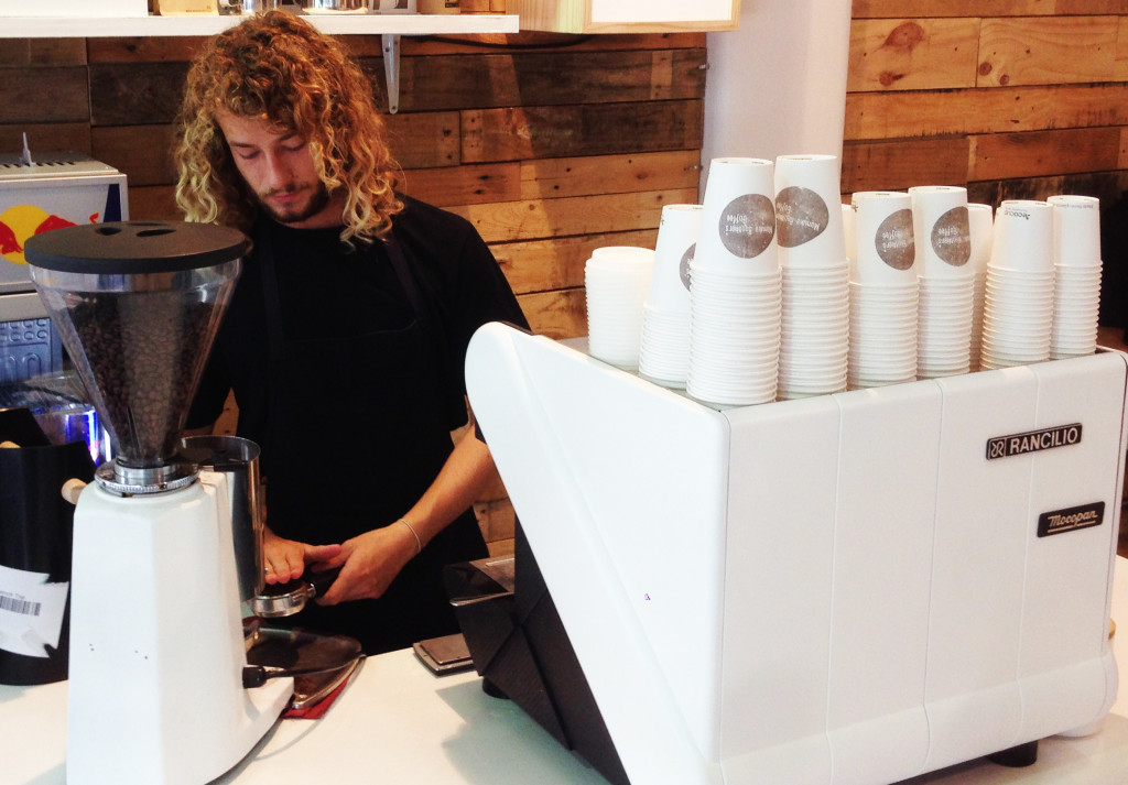CRATE ROAST: Caleb Pribicevich prepares a coffee at Crate Clothing's Ward St store. Photo: Christopher Reive.
