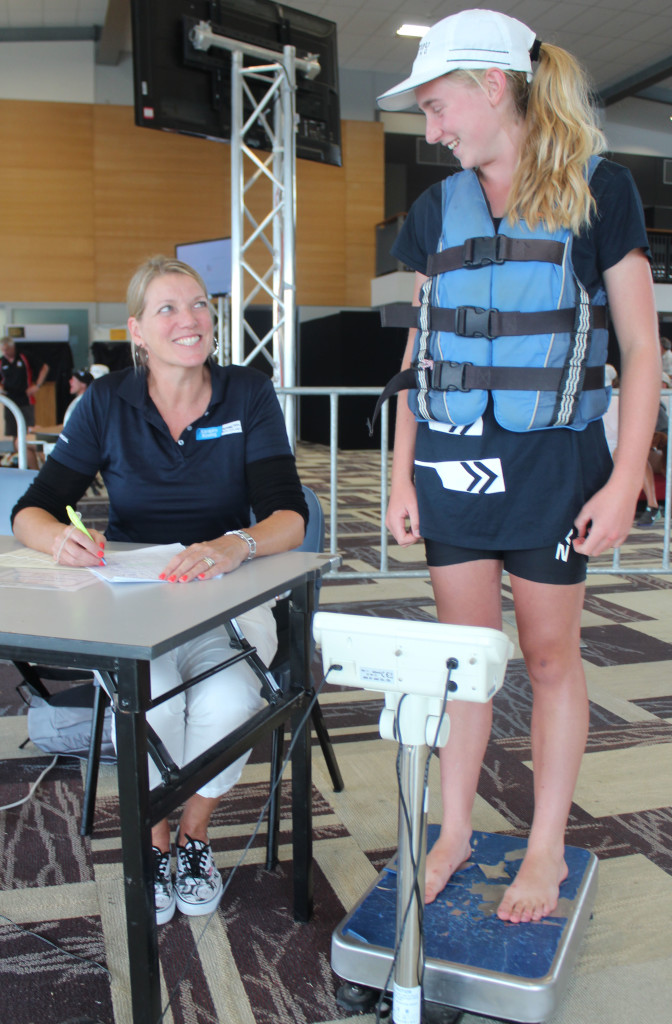 EASY AS: Sandra Groufsky takes Jessica Dicker through the weigh-in process. Photo: Kyra Dawson