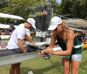 SETTING UP: Sophie and Matt work together