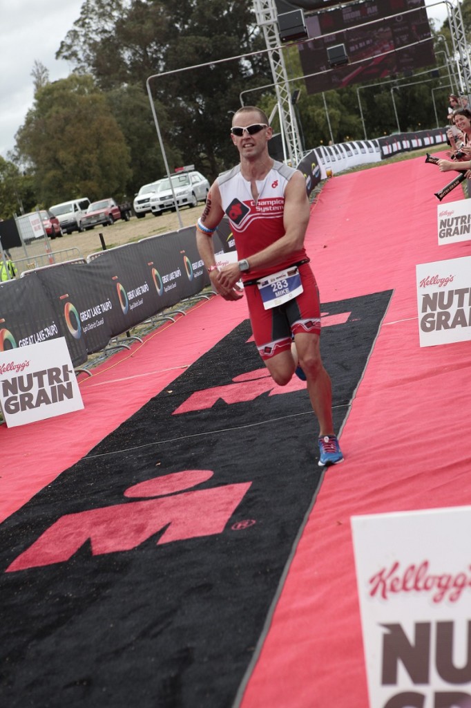TOUGH TAUPO: Hamiltonian Mike Wright pounds over the finish line to end fifth in his age group.