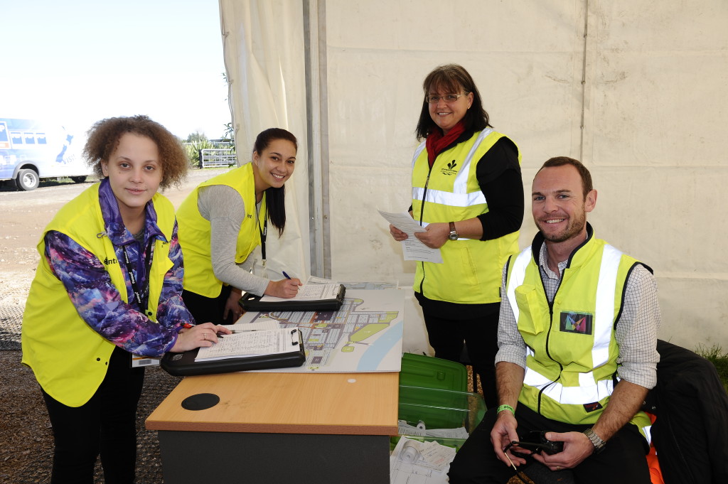 Good to go: Waikato Independent reporters Dasha Kuprienko and Haylee King get induction instructions from Paula Lovegrove and Guy De Salis before going onto the Mystery Creek site. Photo: Geoff Ridder