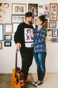 Logan and Leila Bell in front of photos of those who matter most there family. Photo: Krystal Higgins