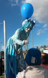 CHILDREN'S DELIGHT: Balloons were handed out to children by council workers and stilt walkers. Photo: Shontelle Cargill