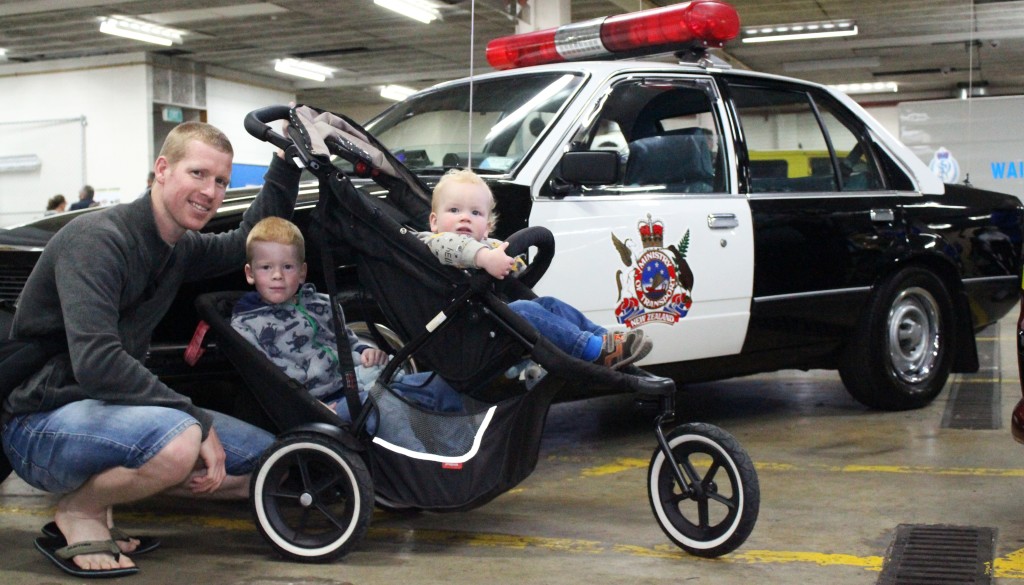 Shane Easton and his sons Luke and Kyle (R) enjoyed the vintage police cars. Photo: Christopher Reive.