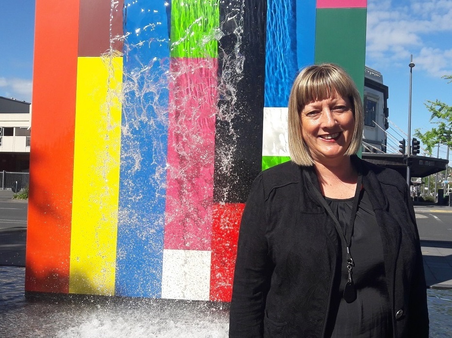 Waikato Museum director Cherie Meecham with The Tongue of the Dog sculpture situated outside of the museum. Photo by Shontelle Campbell